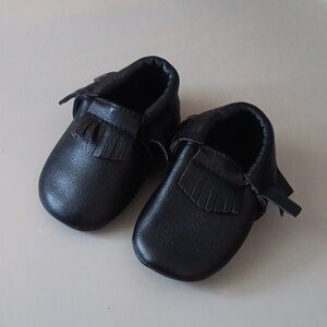 Black leather moccasins